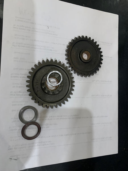 Can Am Rotax 2 Gears  and 3 shims, USED Parts
